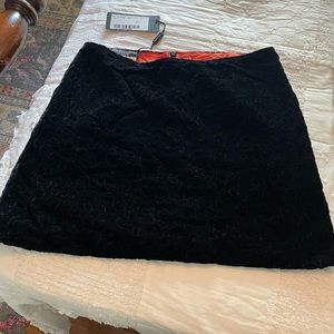 Black “mini” velvet skirt